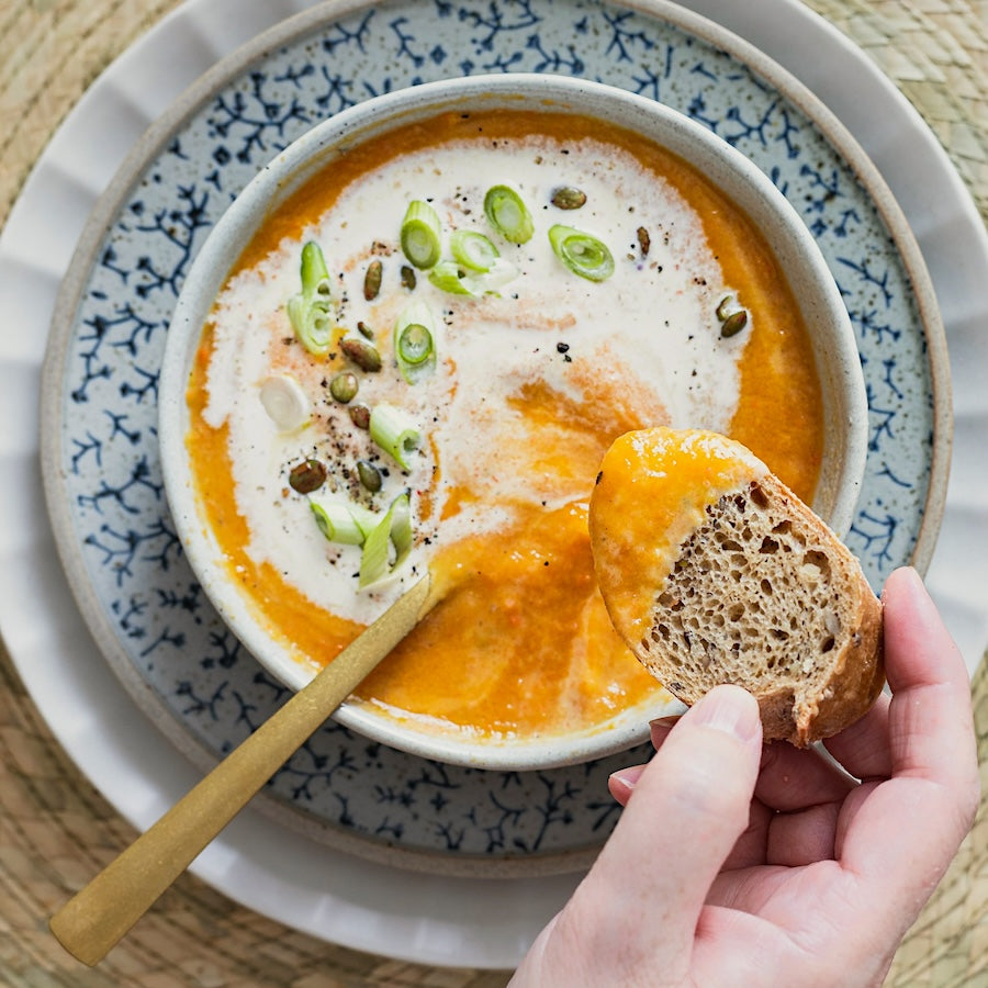 Seasonal Northern meal of Warming Winter Squash Soup with rustic brown bread.